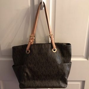 MK Michael Kors brown purse with two side pockets